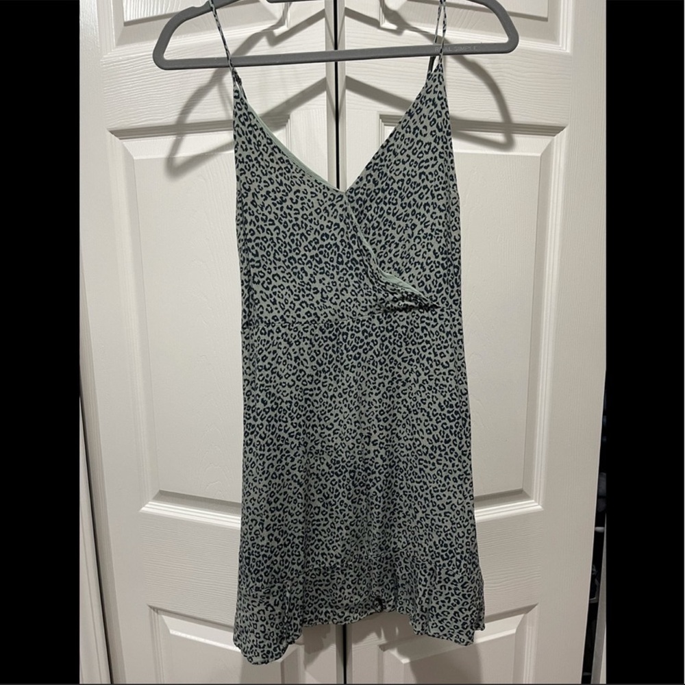 All In Favor green cheetah print mini dress